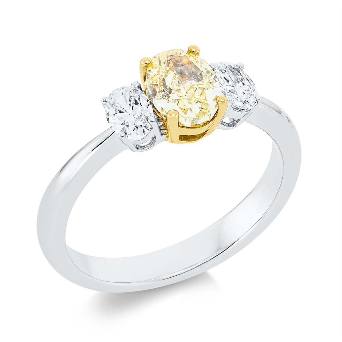 oval fancy colored diamond ring in white gold / yellow gold