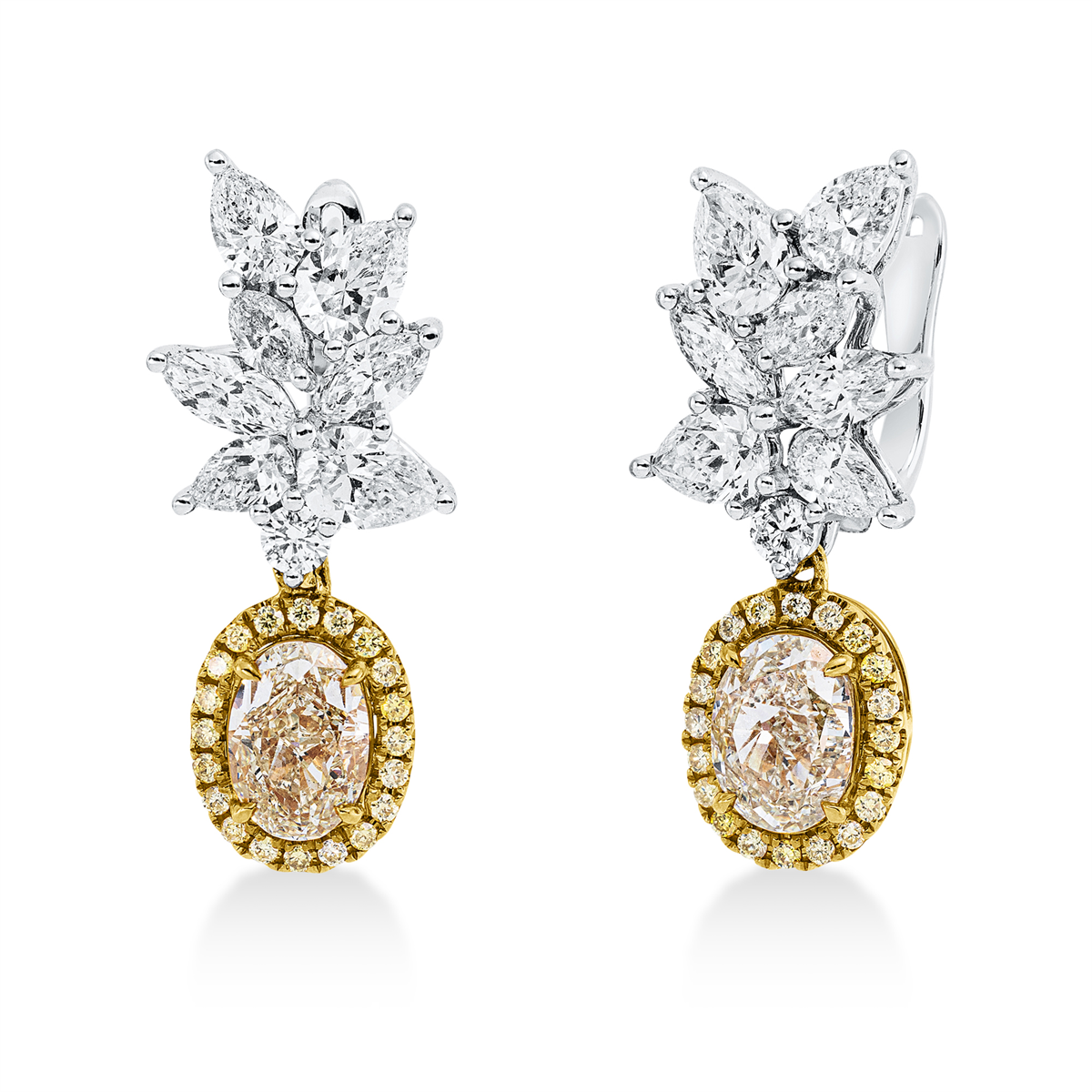 diamond full cut fancy colored diamond earrings in white gold / yellow gold
