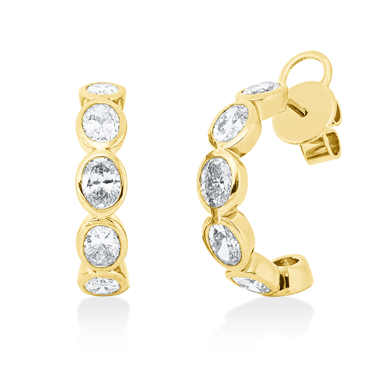 oval exclusive studs in yellow gold