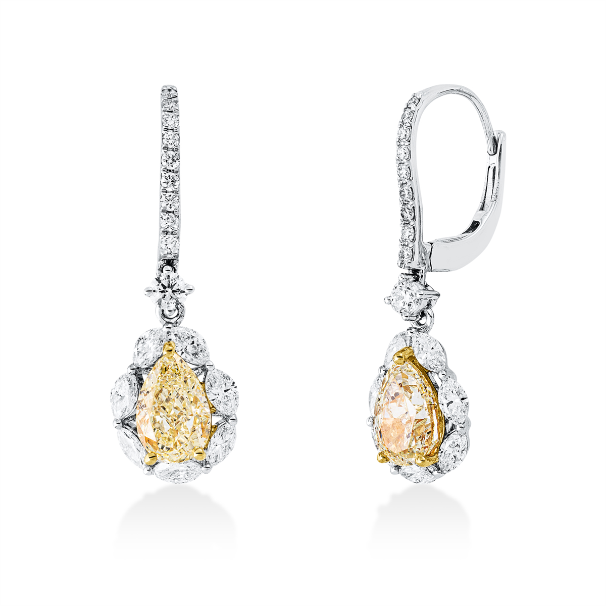 diamond full cut fancy colored diamond earrings in white gold / yellow gold