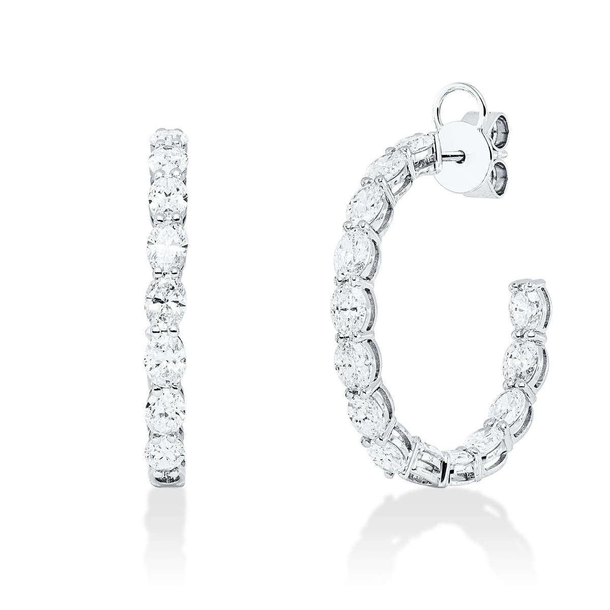 oval exclusive studs in white gold