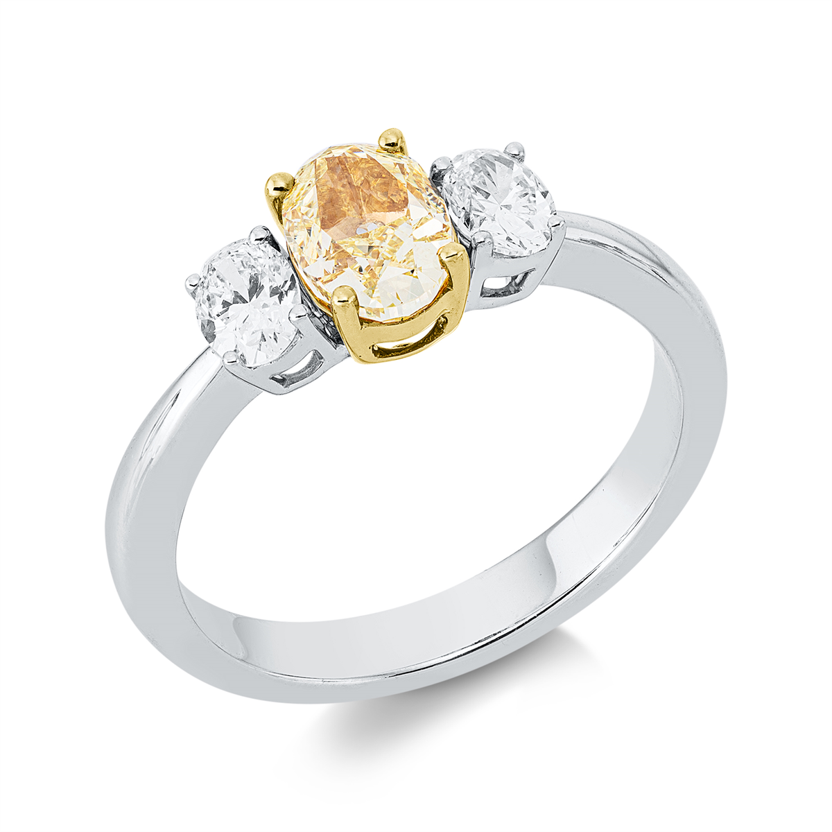 oval  fancy colored diamond ring in white gold / yellow gold