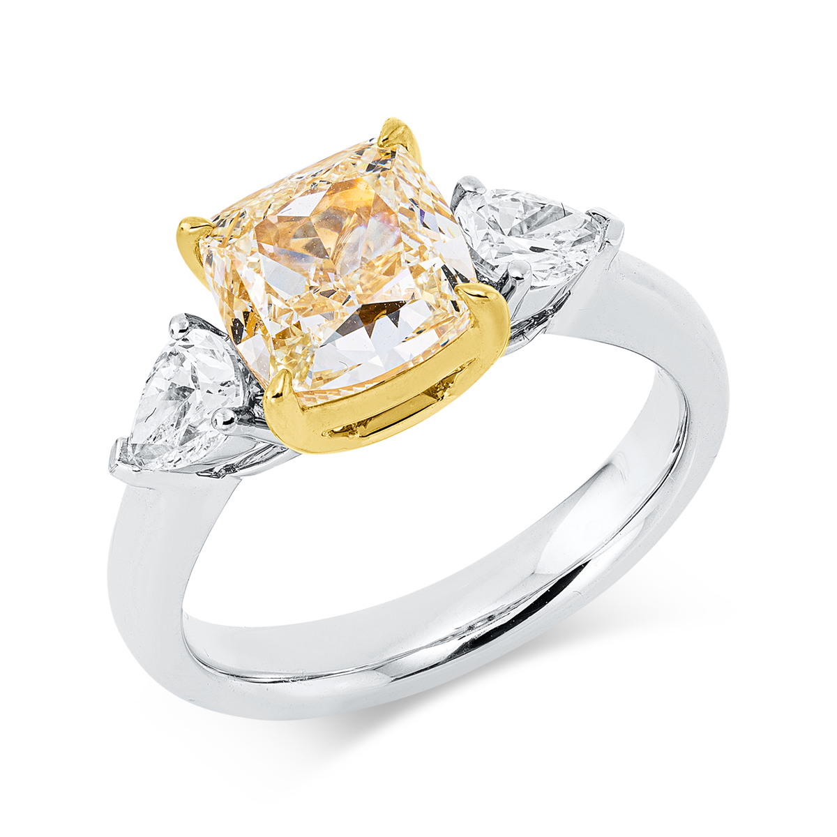 pear shape  fancy colored diamond ring in white gold / yellow gold