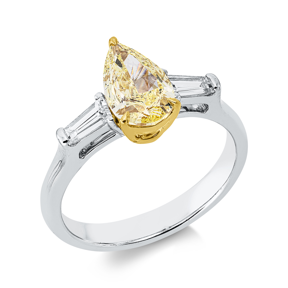 pear shape  fancy colored diamond ring in white gold / yellow gold