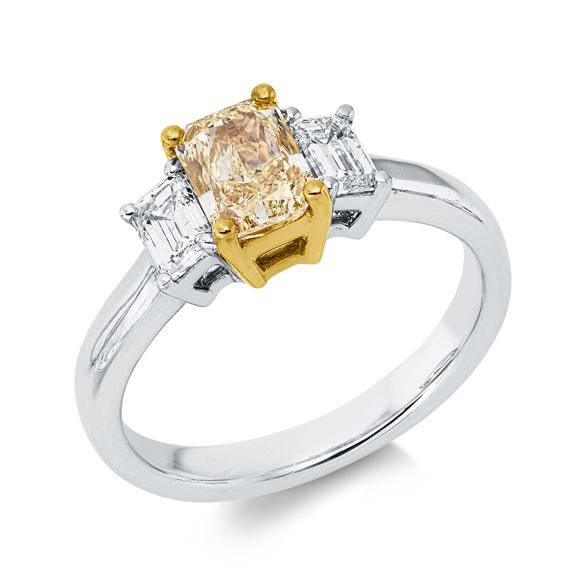emerald cut  fancy colored diamond ring in white gold / yellow gold
