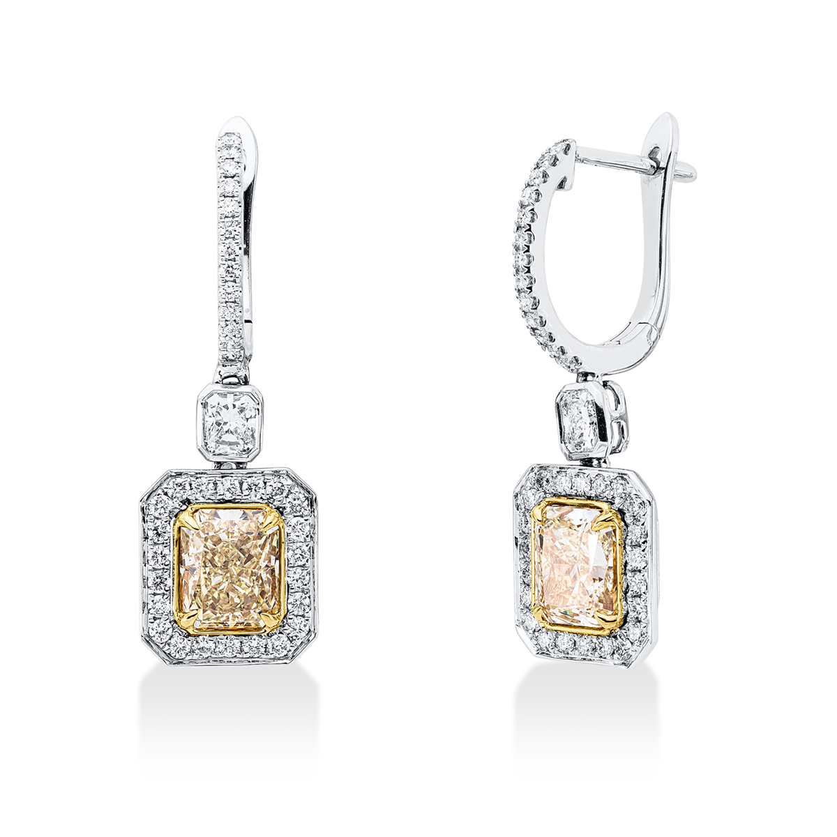 radiant cut  fancy colored diamond earrings in white gold / yellow gold