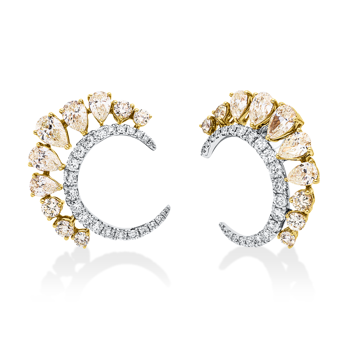 pear shape  fancy colored diamond studs in yellow gold platinum 950