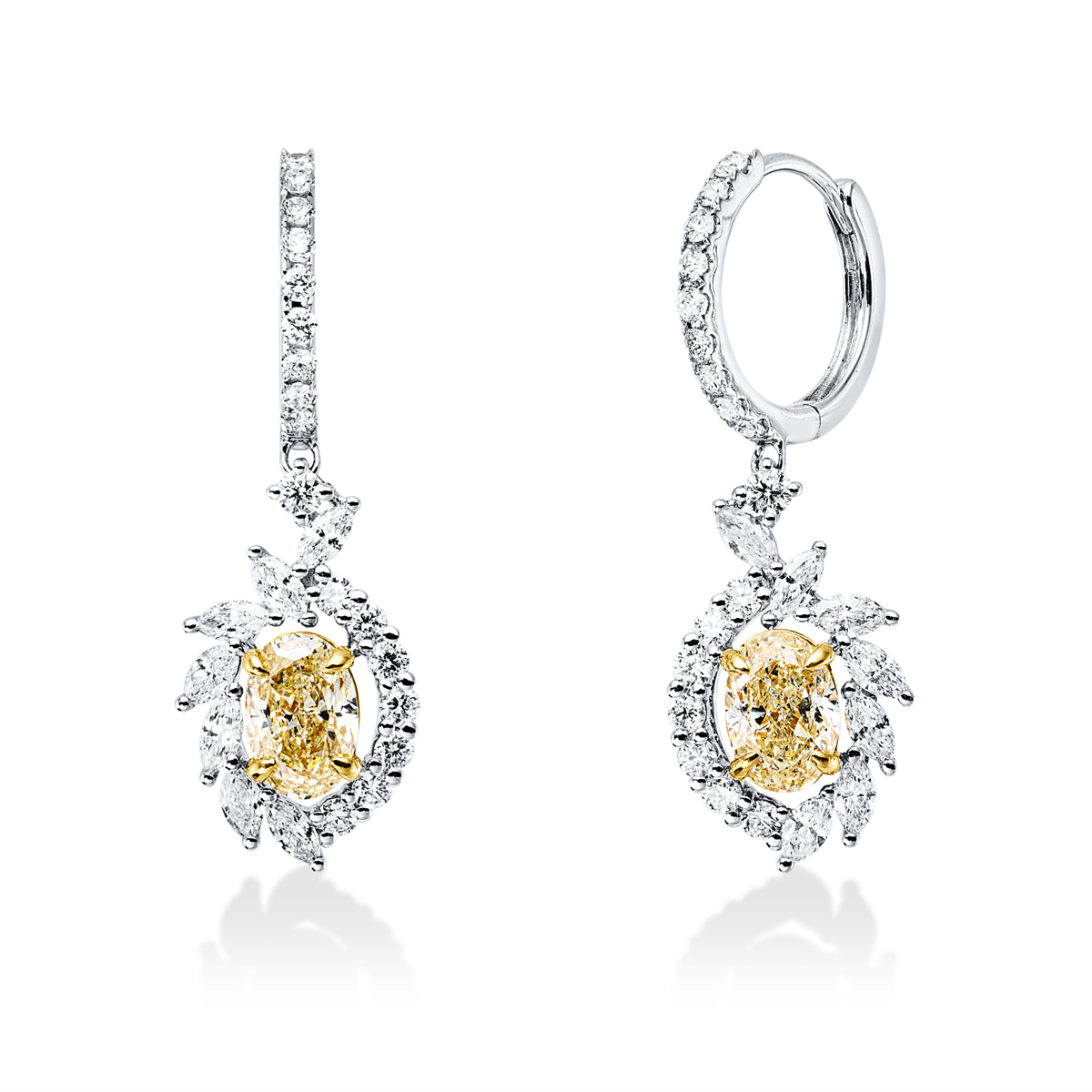 diamond full cut  fancy colored diamond earrings in white gold / yellow gold
