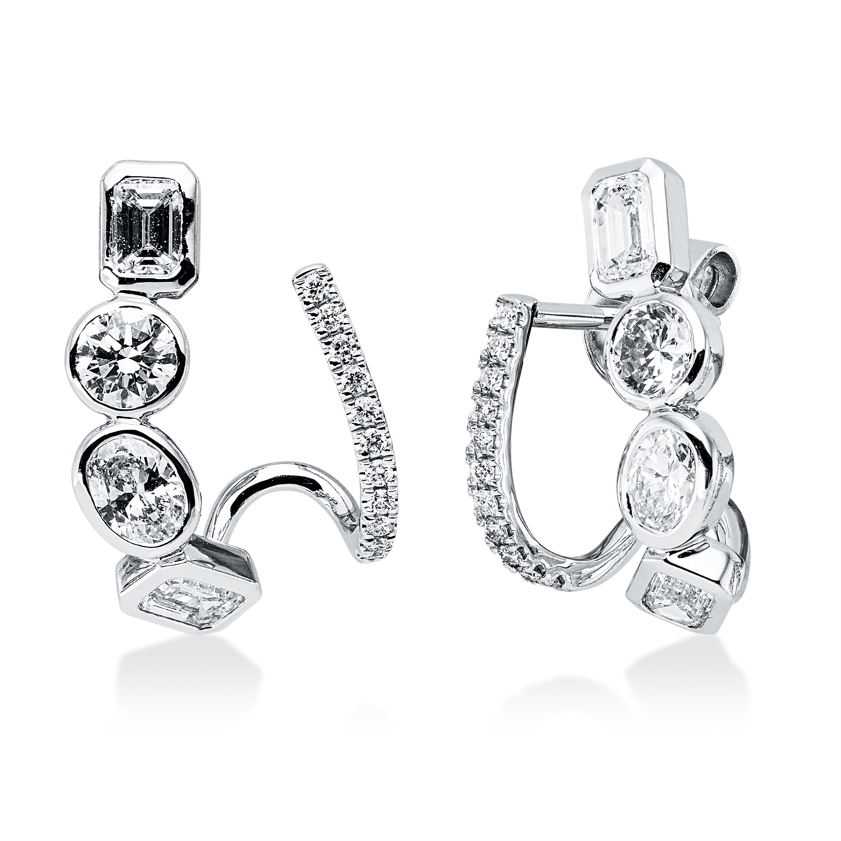 emerald cut  exclusive studs in white gold